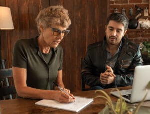 Man and woman at desk