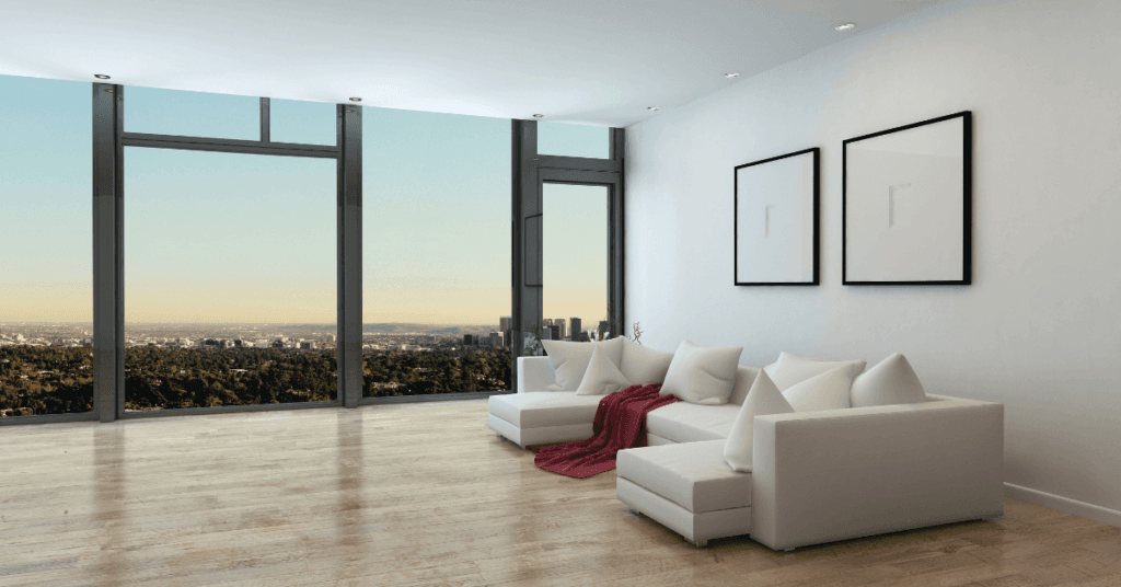View from a high-level apartment with floor-to-ceiling glass windows